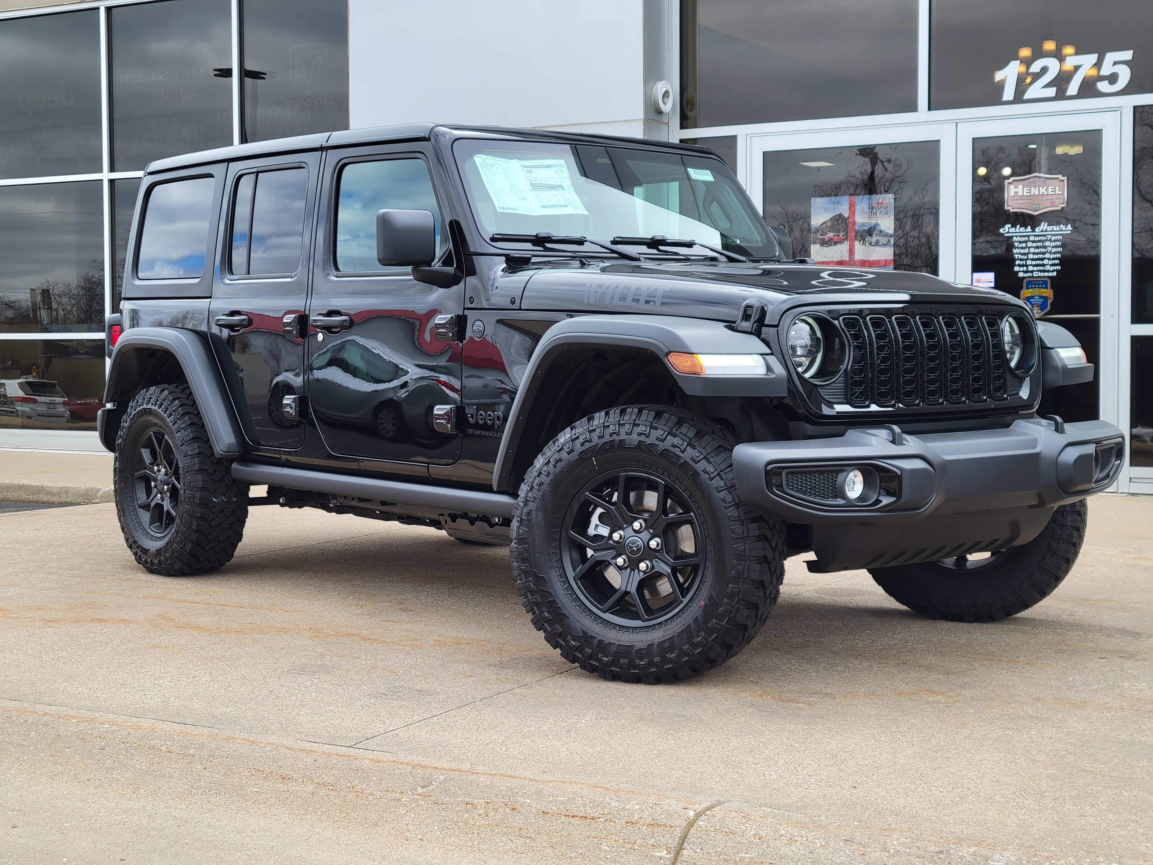 2026 Jeep Wrangler WRANGLER 4-DOOR WILLYS in Black Clear-Coat Exterior Paint — front three-quarter view