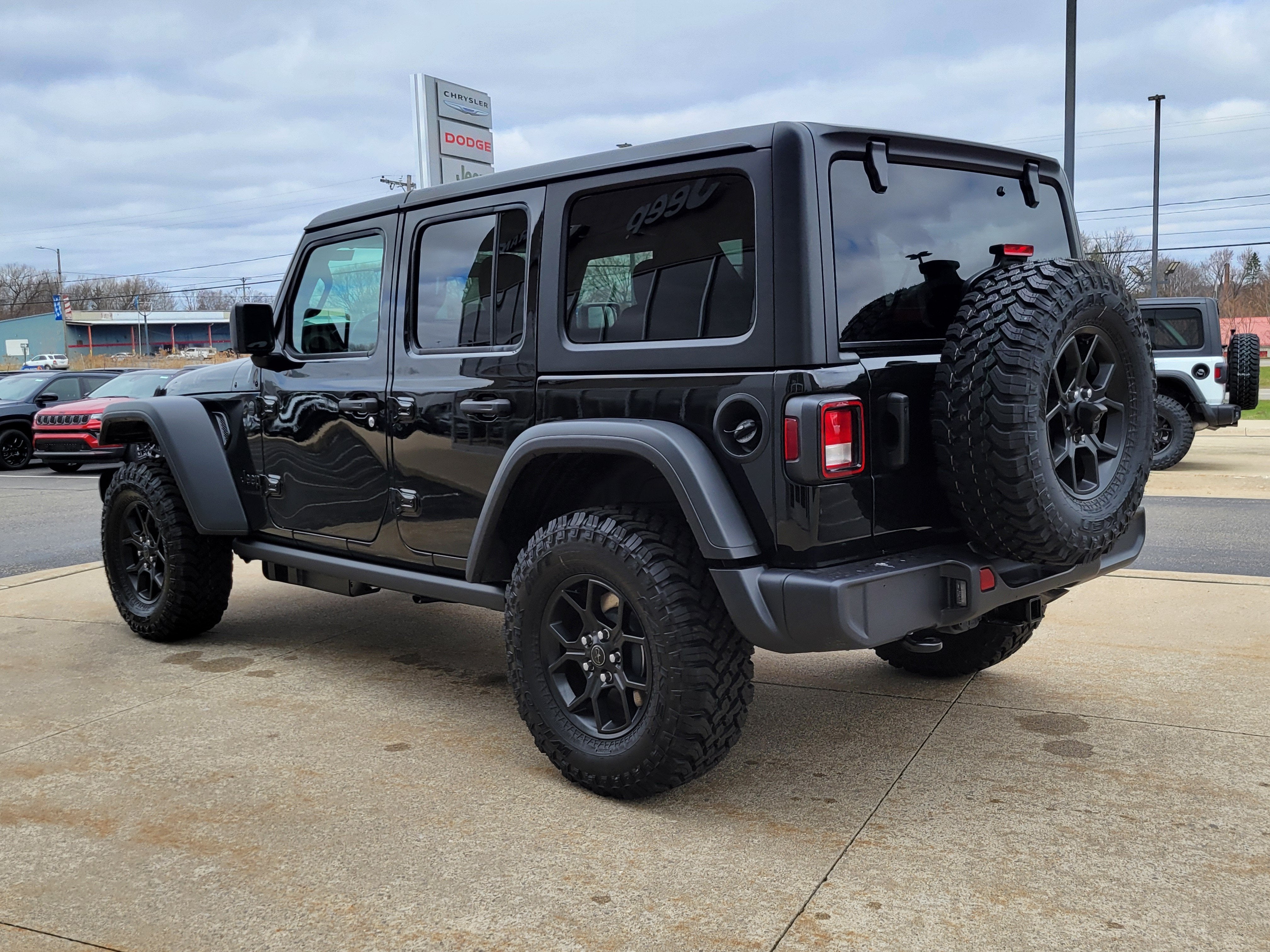 2026 Jeep Wrangler — rear three-quarter view
