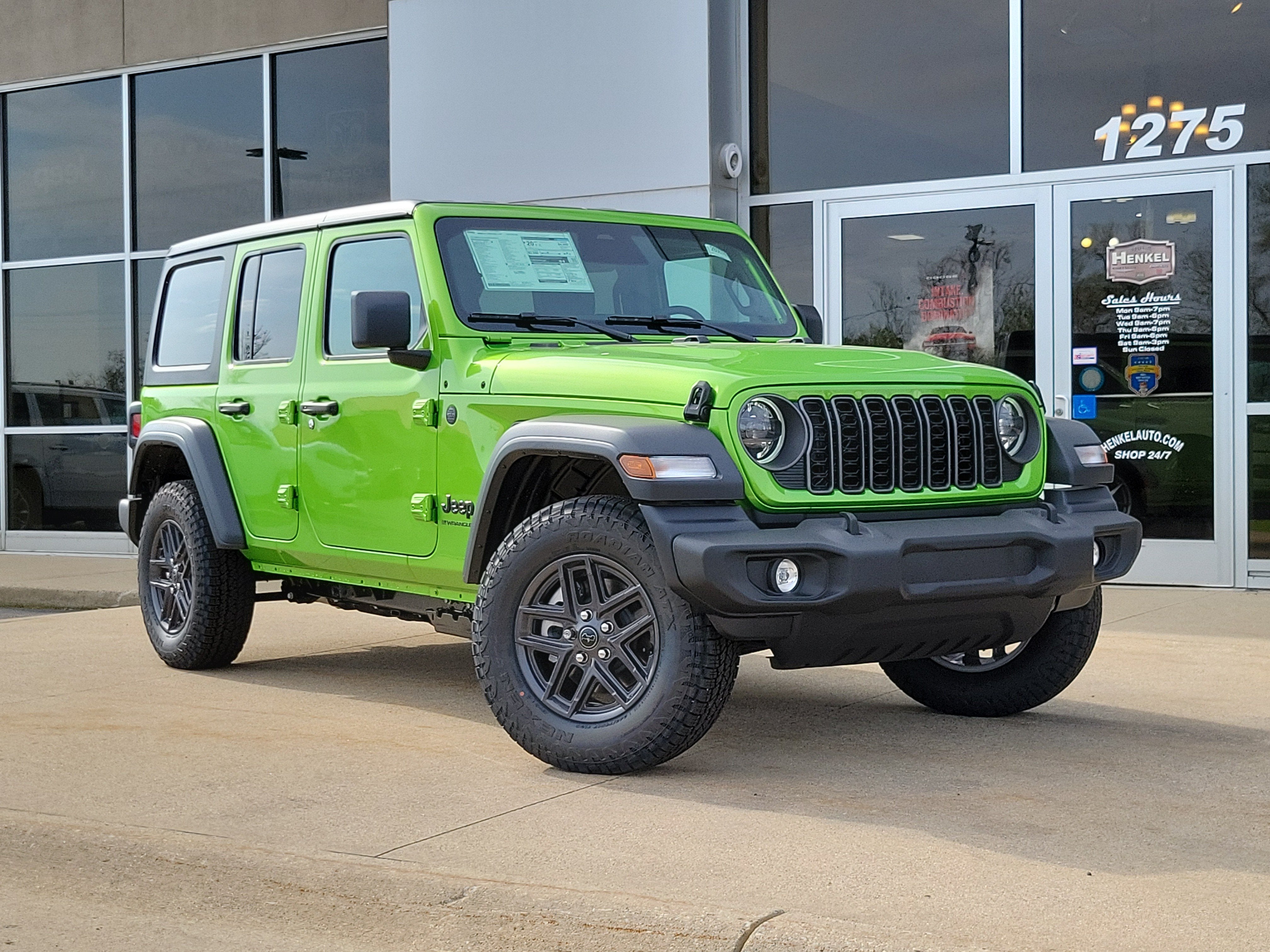 2026 Jeep Wrangler WRANGLER 4-DOOR SPORT S in Mojito Clear-Coat Exterior Paint — front three-quarter view