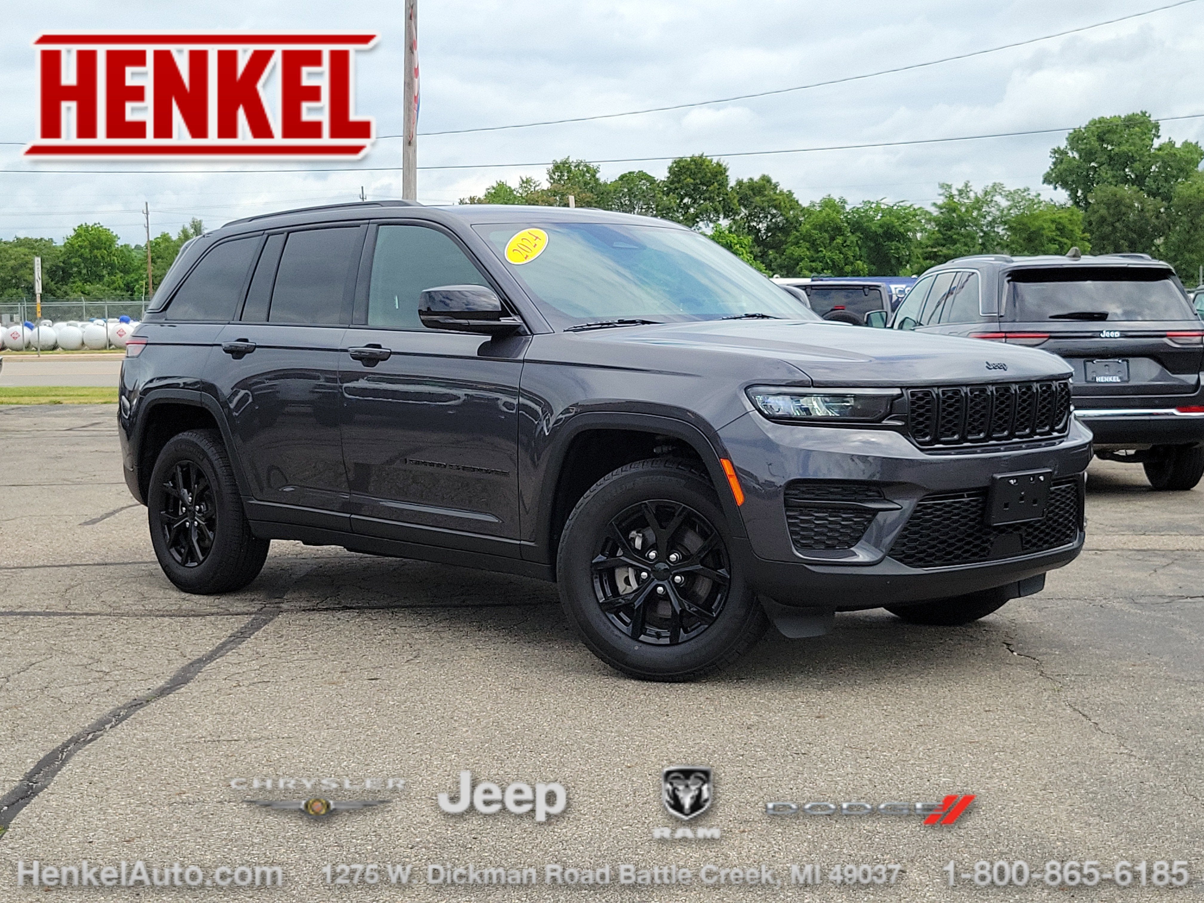 2024 Jeep Grand Cherokee Altitude 4x4 in Baltic Gray Metallic Clearcoat — front three-quarter view