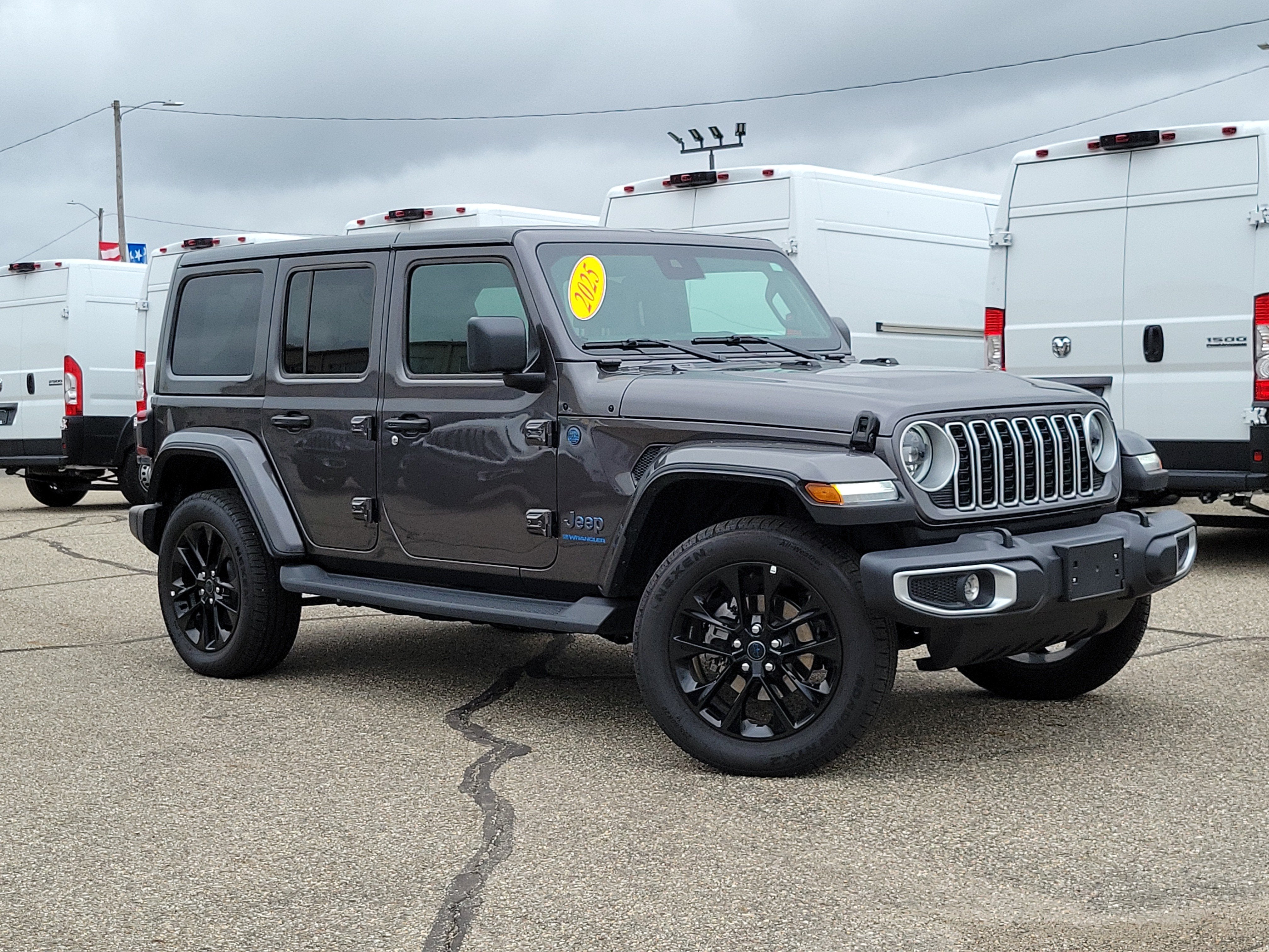 2025 Jeep Wrangler 4xe Sahara 4xe in Granite Crystal Metallic Clearcoat — front three-quarter view