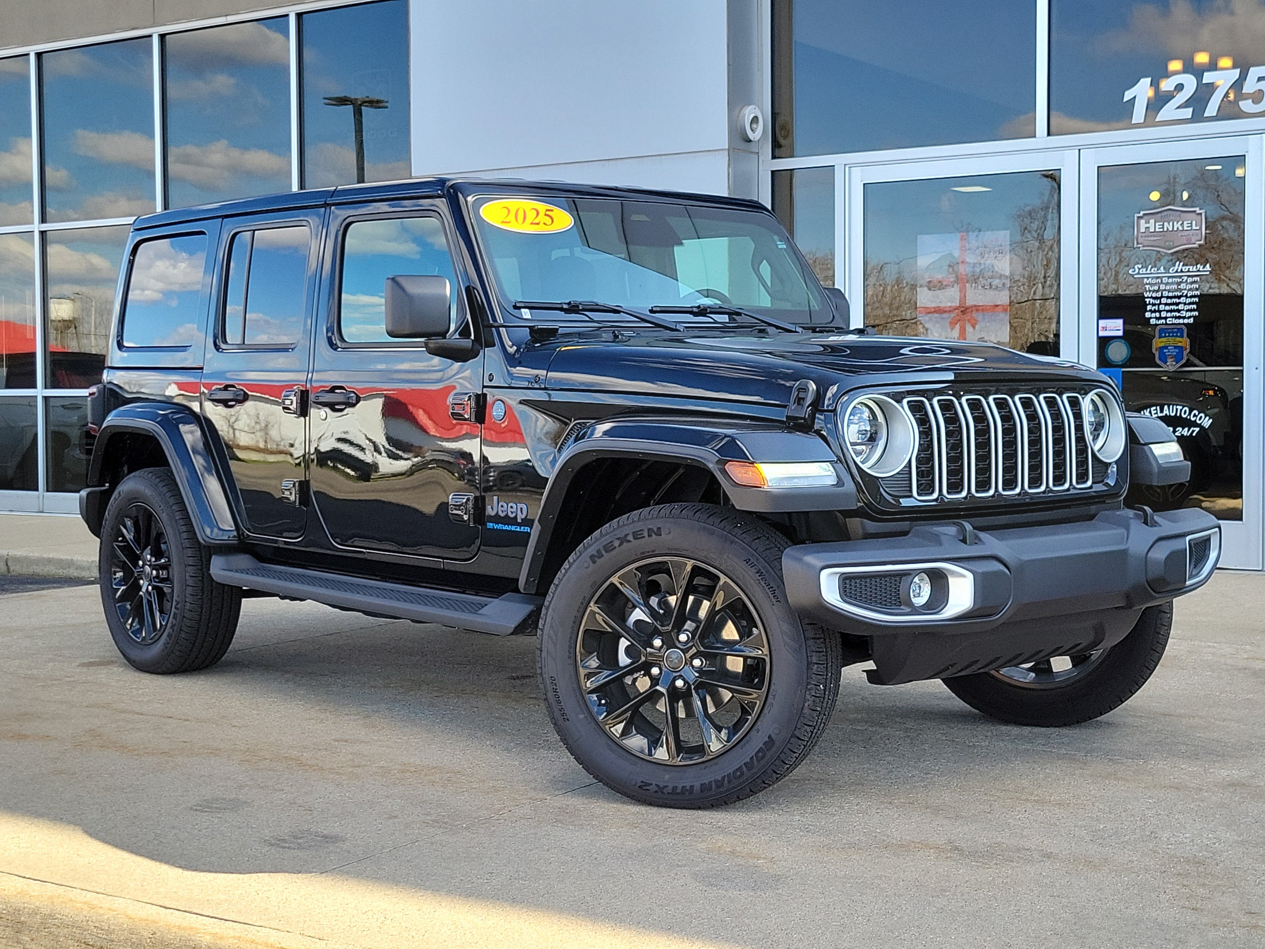 2025 Jeep Wrangler 4xe Sahara 4xe in Black Clearcoat — front three-quarter view