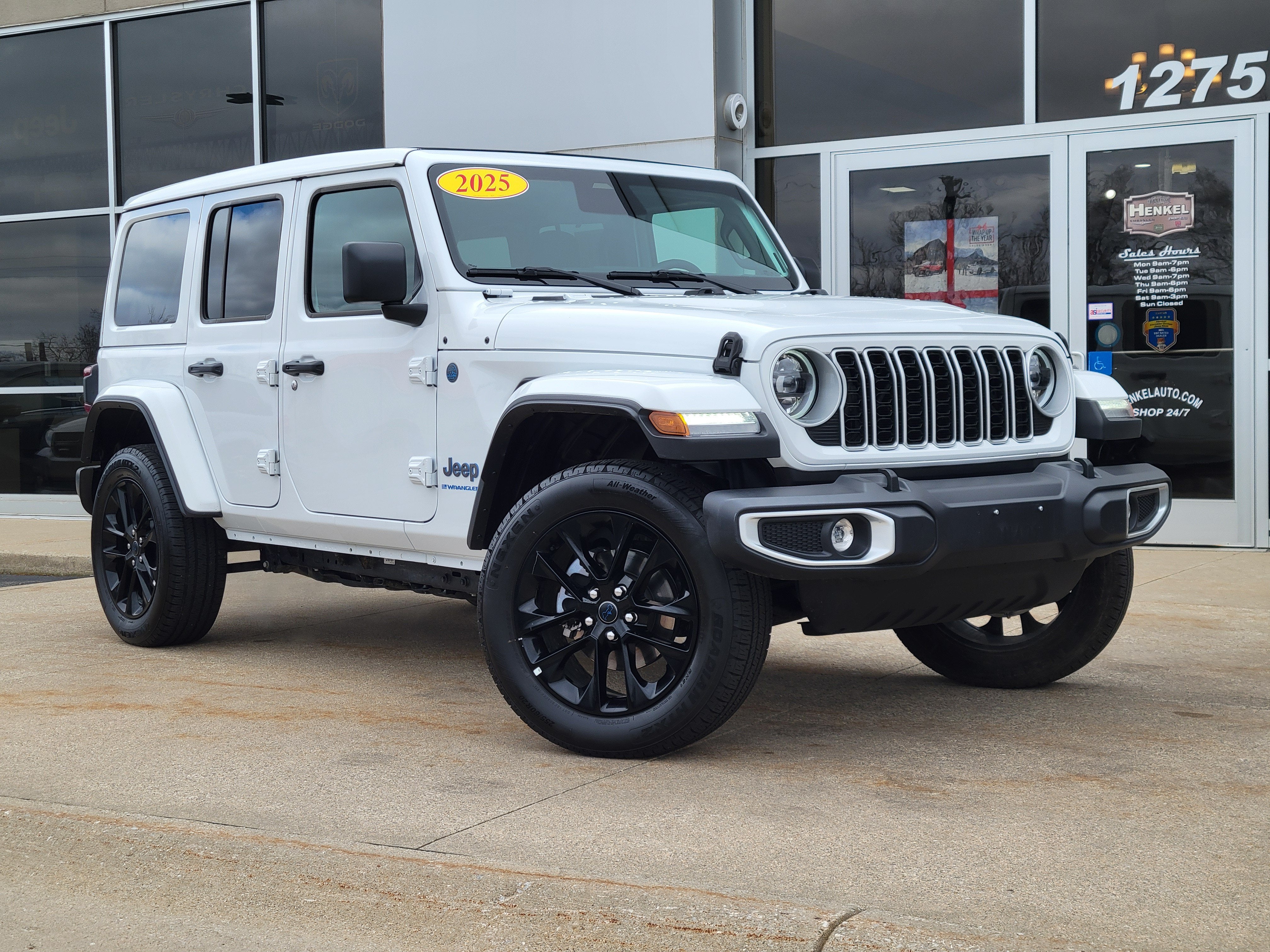 2025 Jeep Wrangler 4xe Sahara 4xe in Bright White Clearcoat — front three-quarter view
