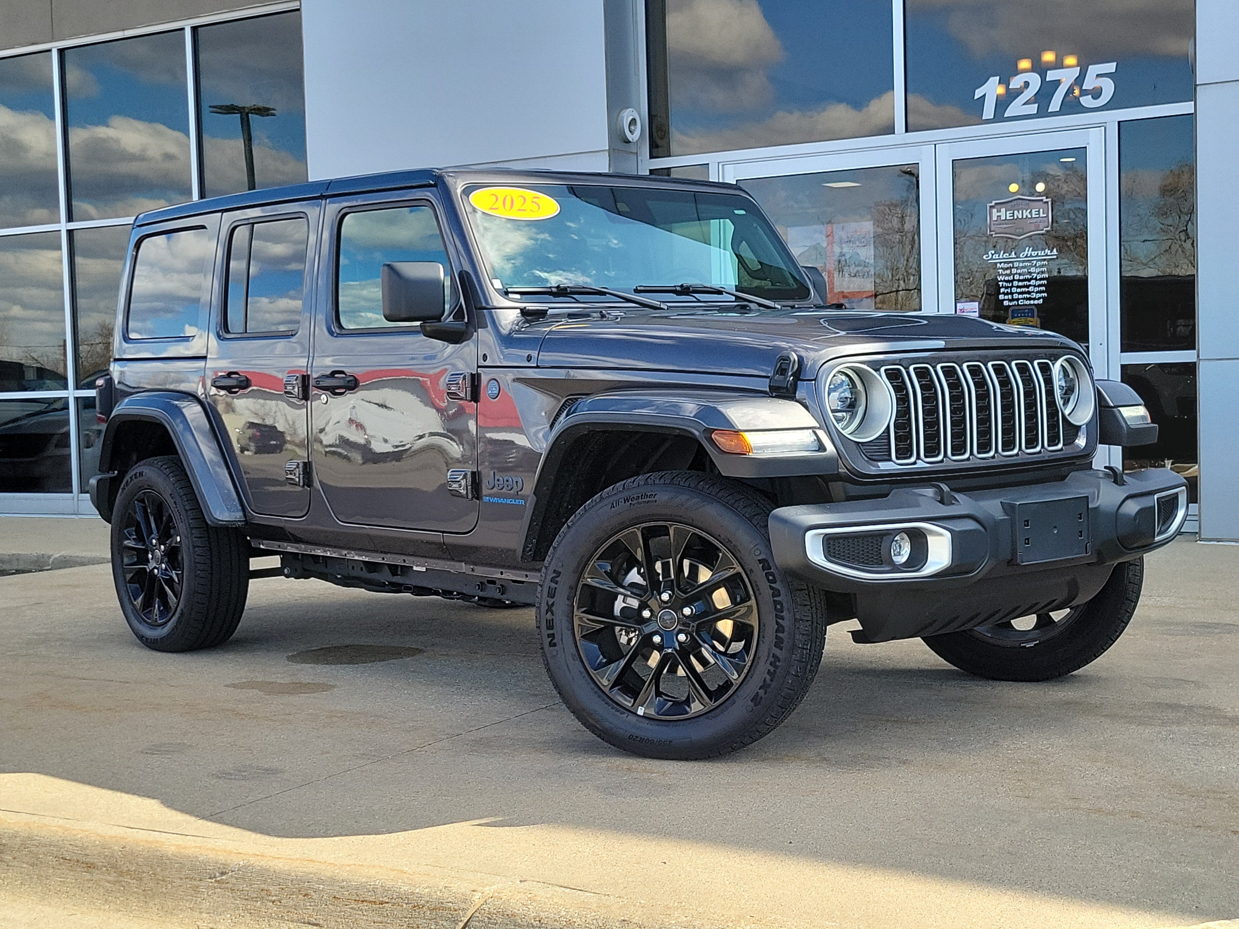 2025 Jeep Wrangler 4xe Sahara 4xe in Granite Crystal Metallic Clearcoat — front three-quarter view