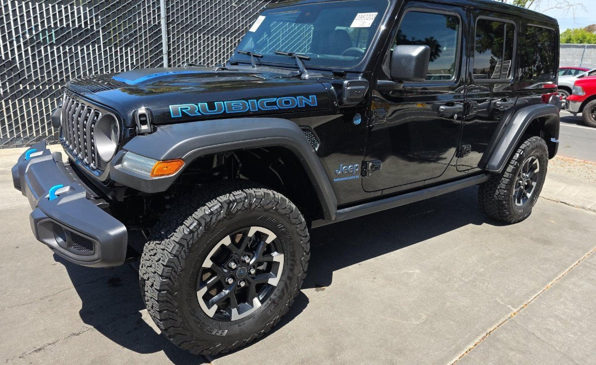 2024 Jeep Wrangler 4xe Rubicon 4xe in Black Clearcoat — front three-quarter view