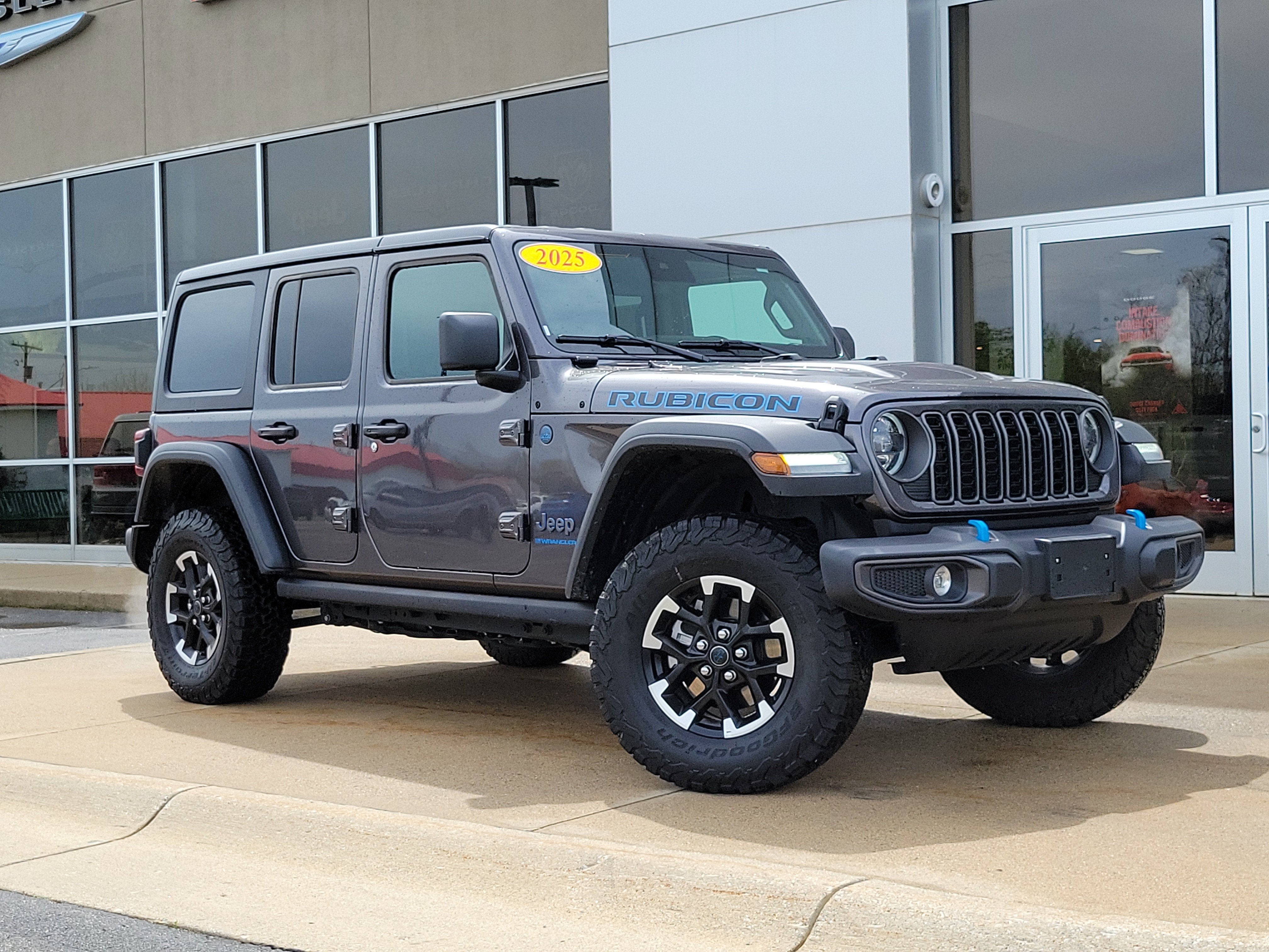 2025 Jeep Wrangler 4xe Rubicon 4xe in Granite Crystal Metallic Clearcoat — front three-quarter view