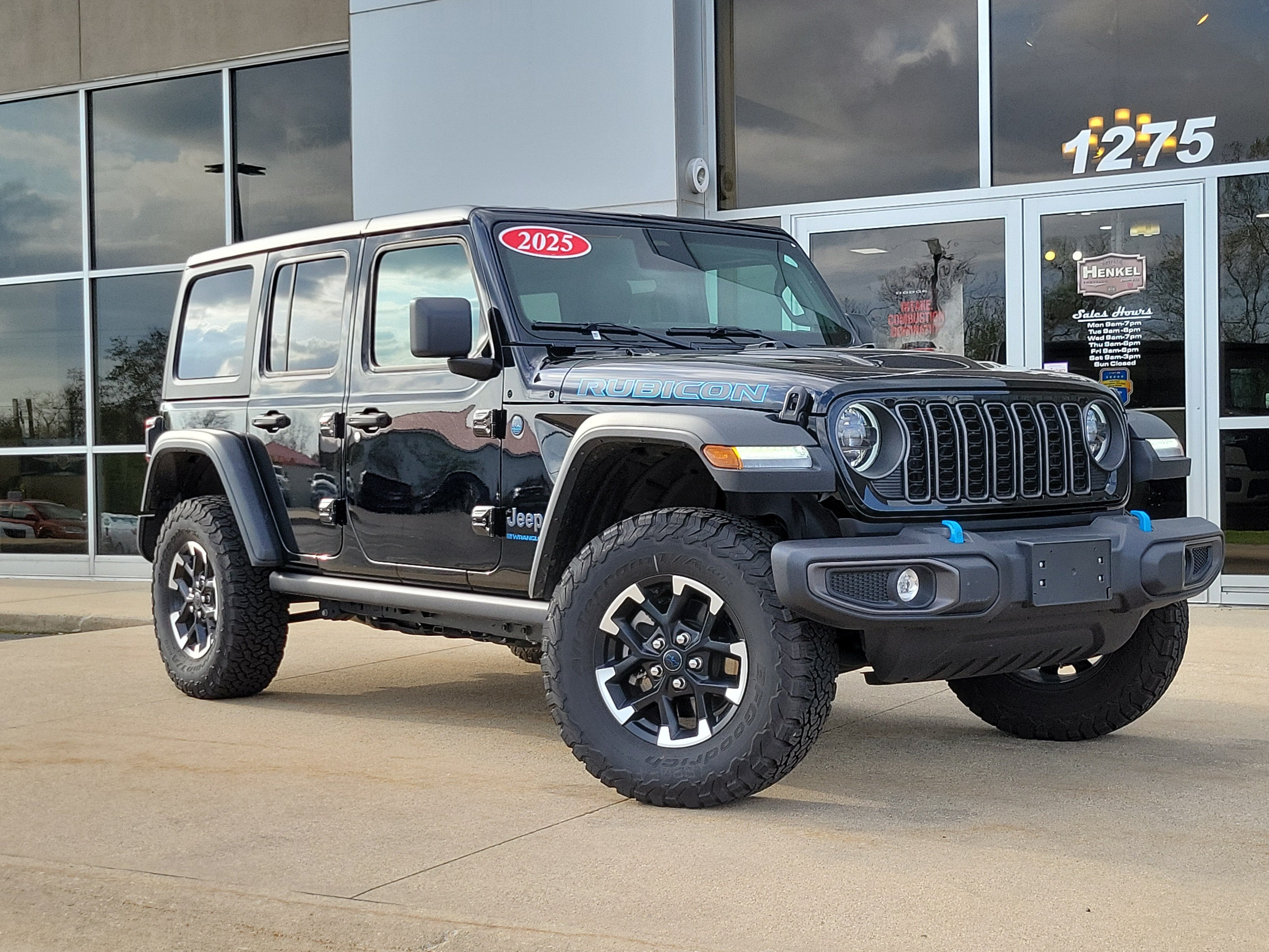 2025 Jeep Wrangler 4xe Rubicon 4xe in Black Clearcoat — front three-quarter view