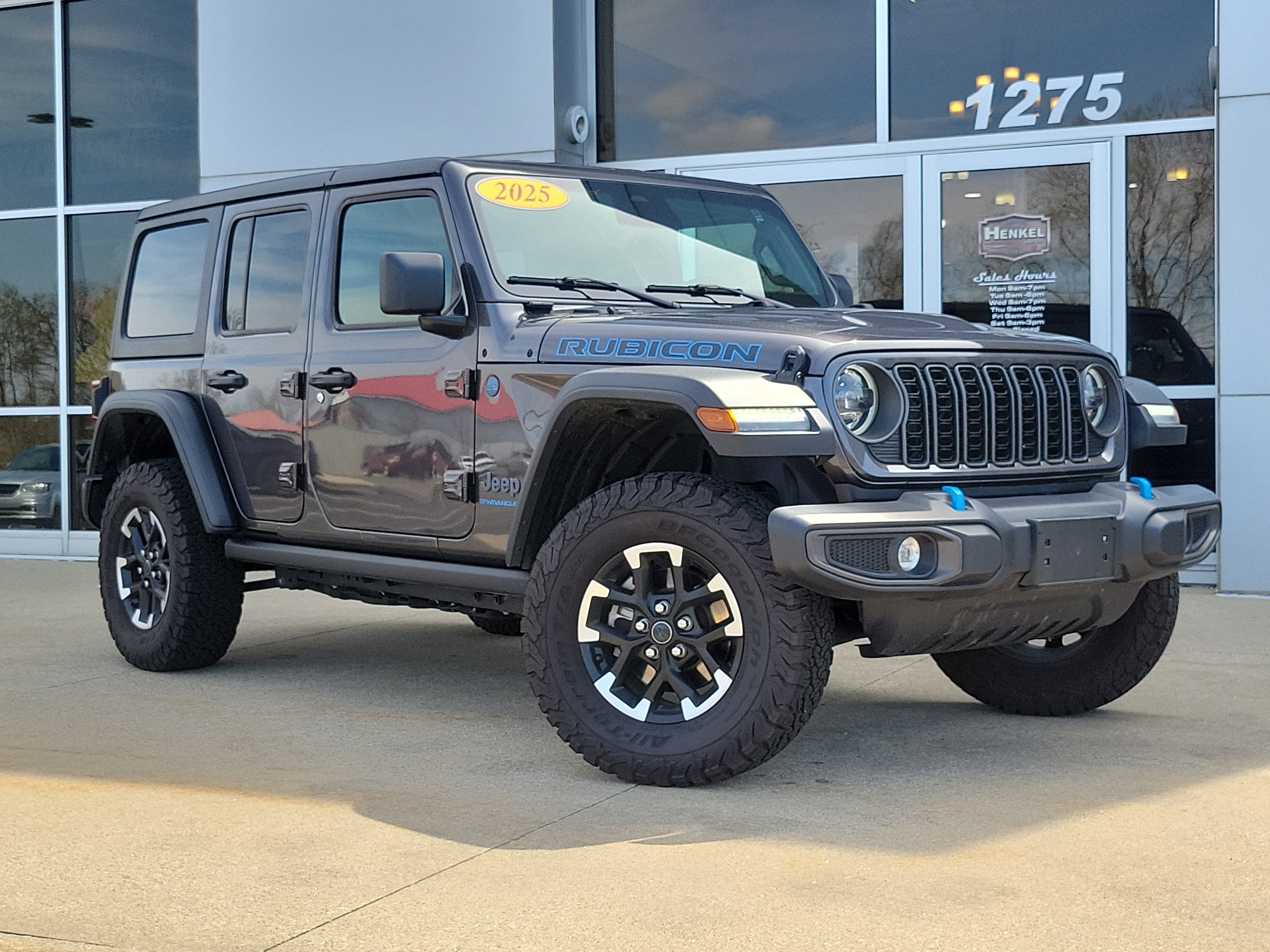 2025 Jeep Wrangler 4xe Rubicon 4xe in Granite Crystal Metallic Clearcoat — front three-quarter view