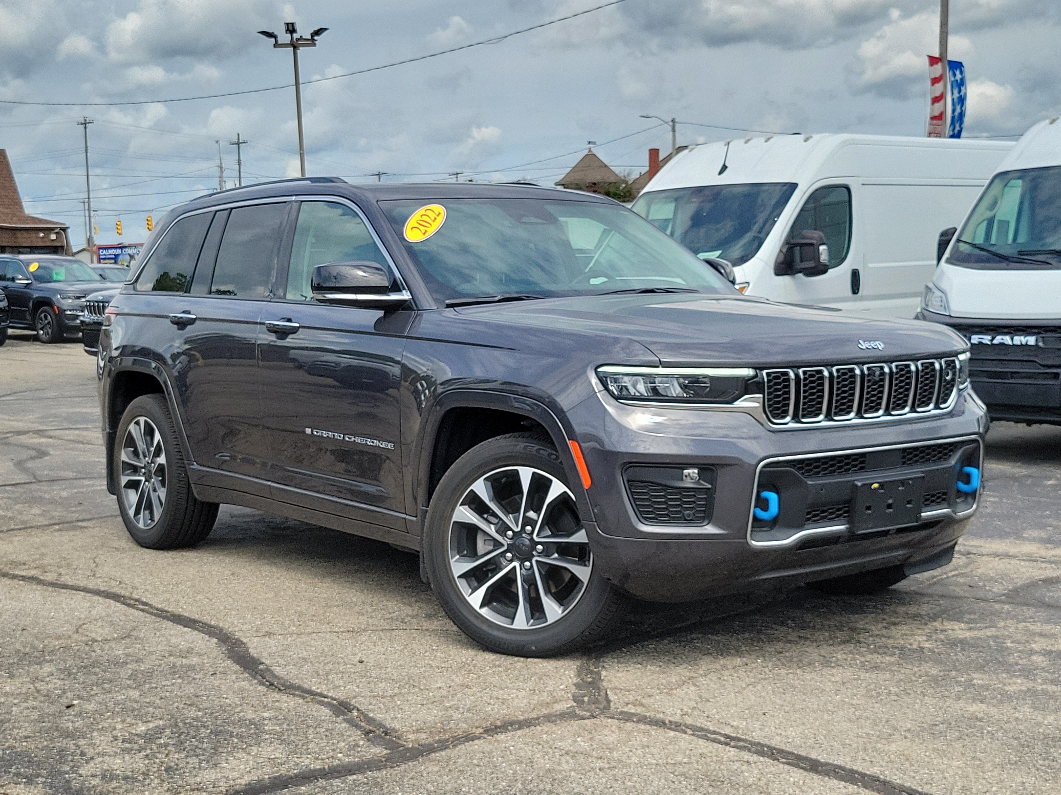 2022 Jeep Grand Cherokee 4xe Overland 4x4 in Baltic Gray Metallic Clearcoat — front three-quarter view