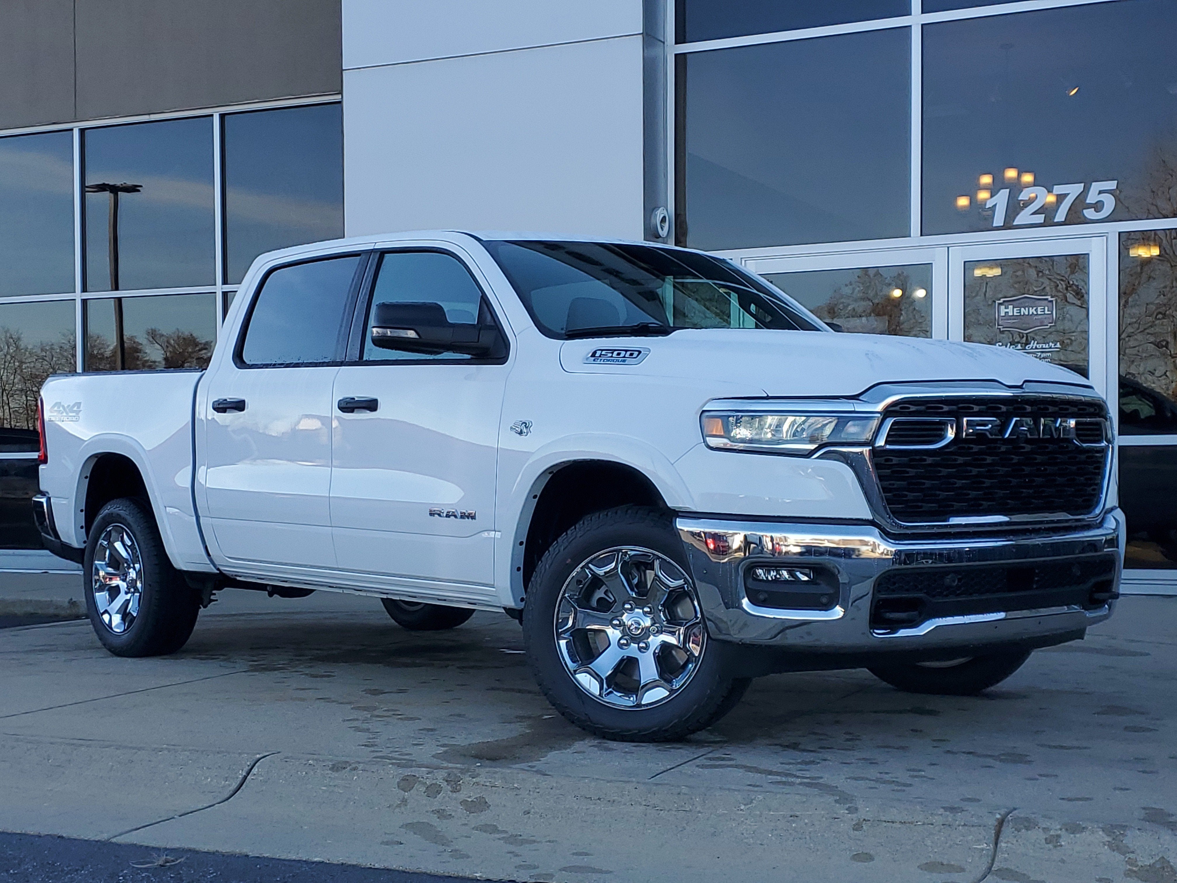 2026 RAM Ram 1500 RAM 1500 BIG HORN CREW CAB 4X4 5'7' BOX in Bright White Clear-Coat Exterior Paint — front three-quarter view