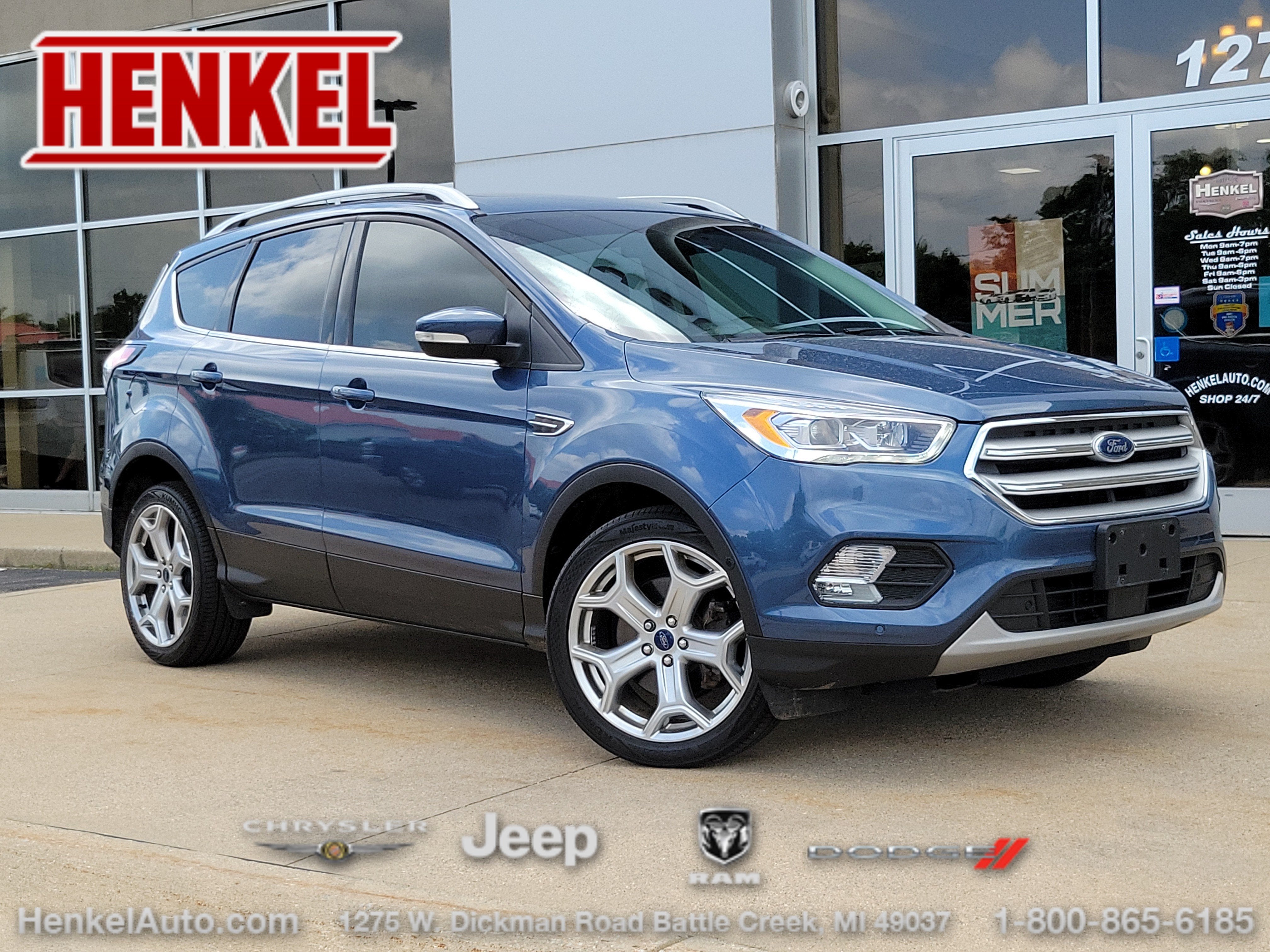 2018 Ford Escape Titanium in Lightning Blue — front three-quarter view