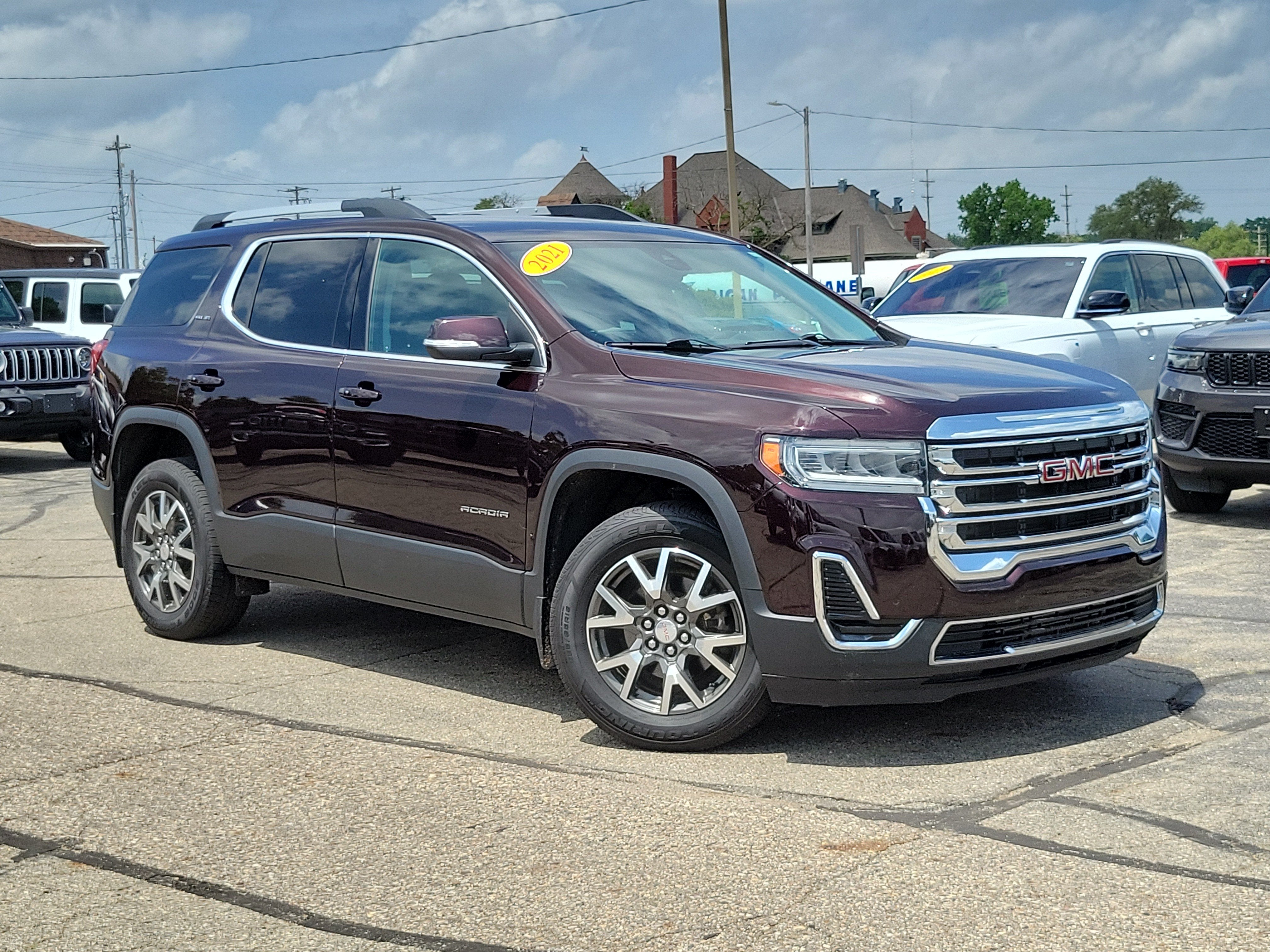 2021 GMC Acadia AWD SLE in Red Mahogany Metallic — front three-quarter view