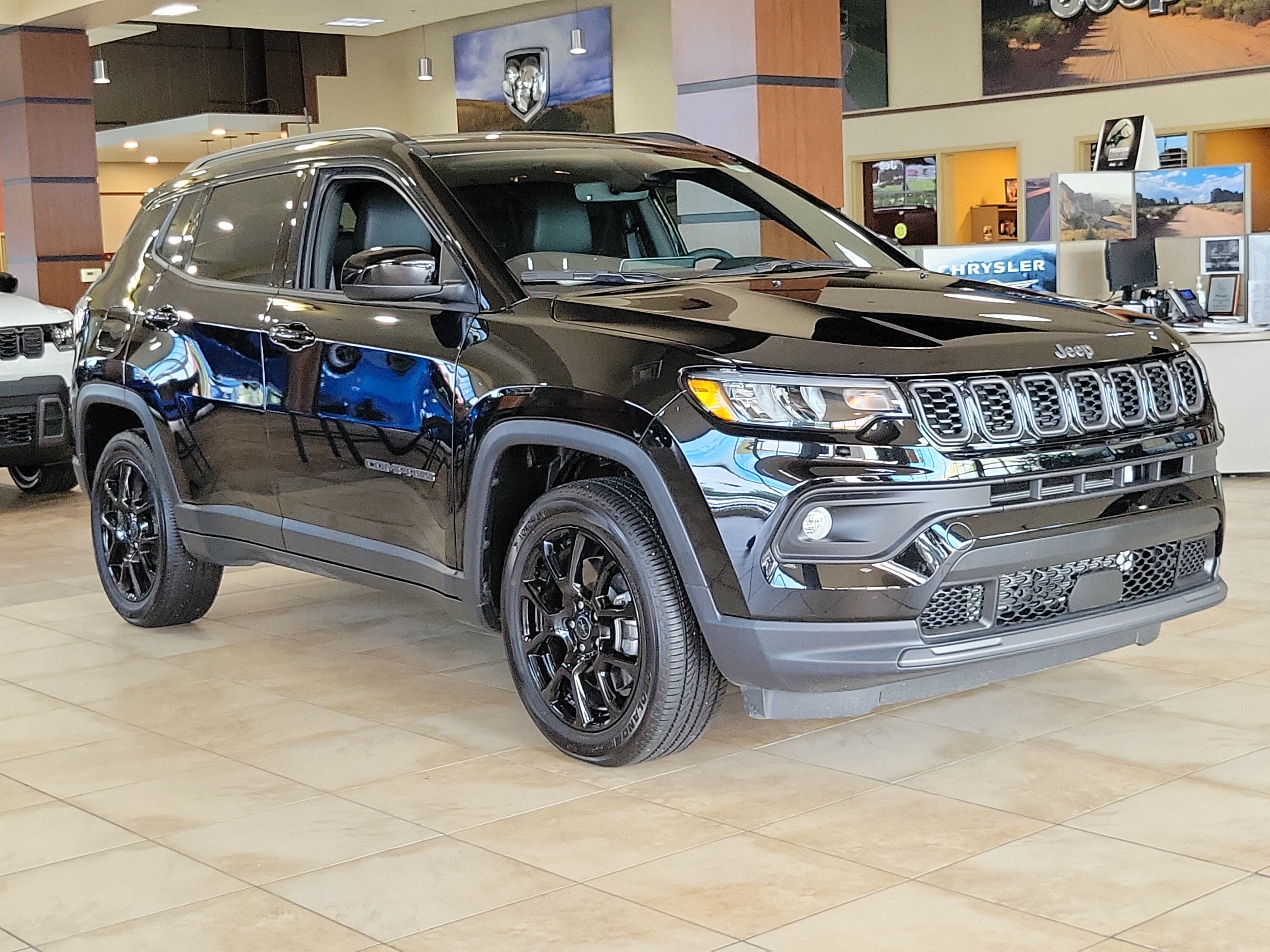 2025 Jeep Compass COMPASS LATITUDE 4X4 in Diamond Black Crystal Pearl-Coat Exterior Paint — front three-quarter view