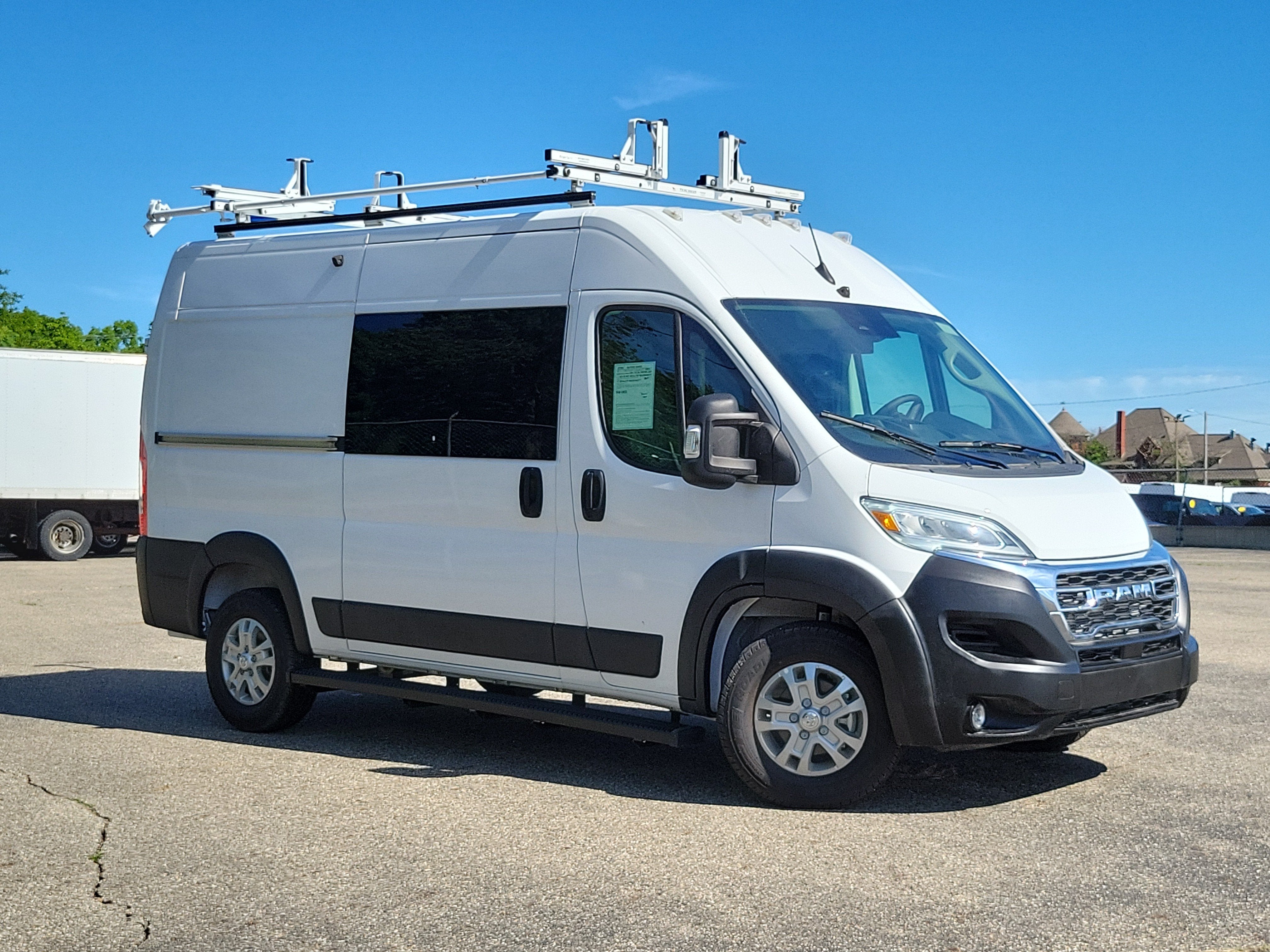2025 RAM ProMaster 1500 Cargo Van SLT High Roof 136' WB in Bright White Clearcoat — front three-quarter view