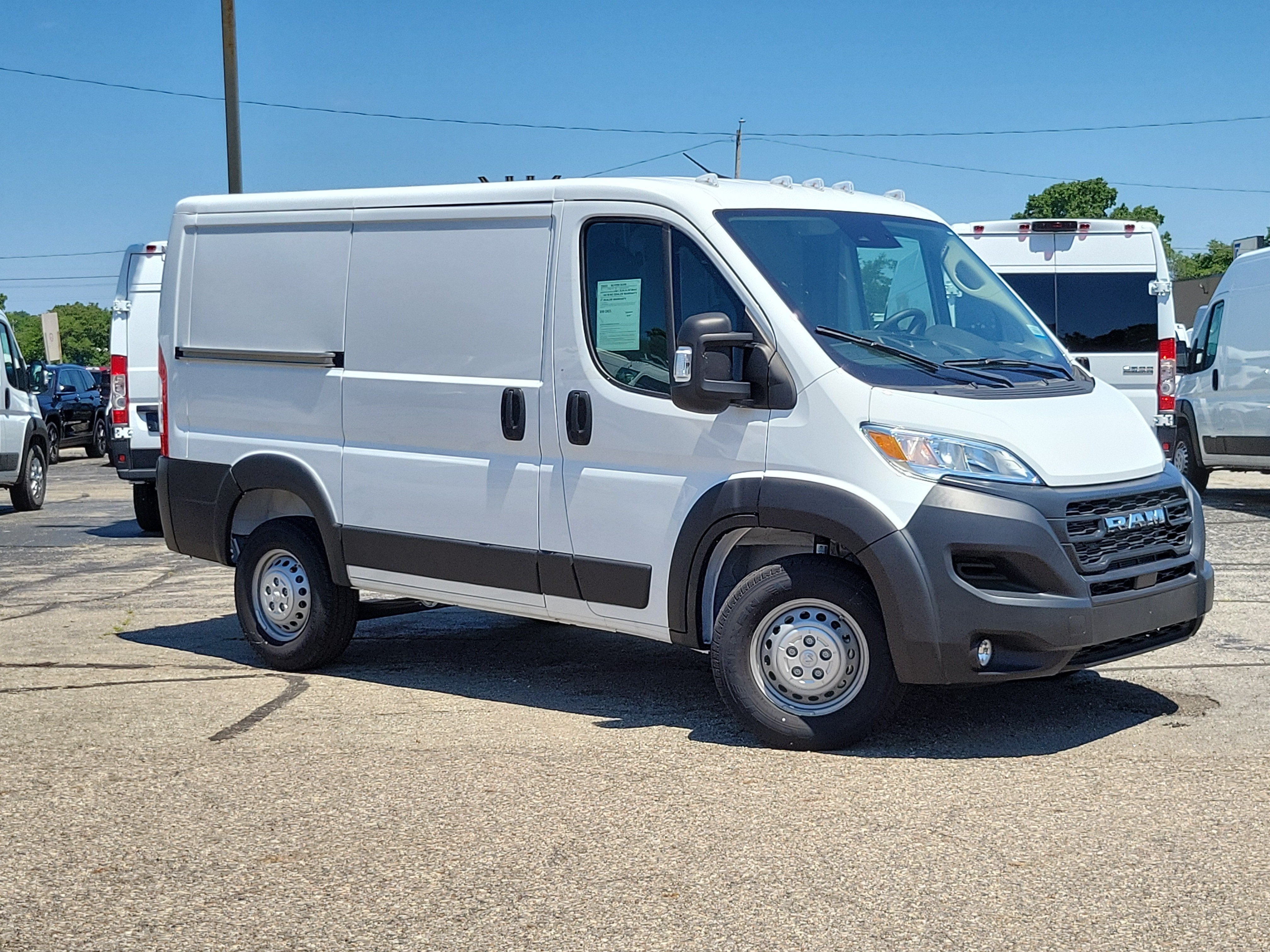 2024 RAM ProMaster 1500 Cargo Van Low Roof 118' WB w/Pass Seat in Bright White Clearcoat — front three-quarter view