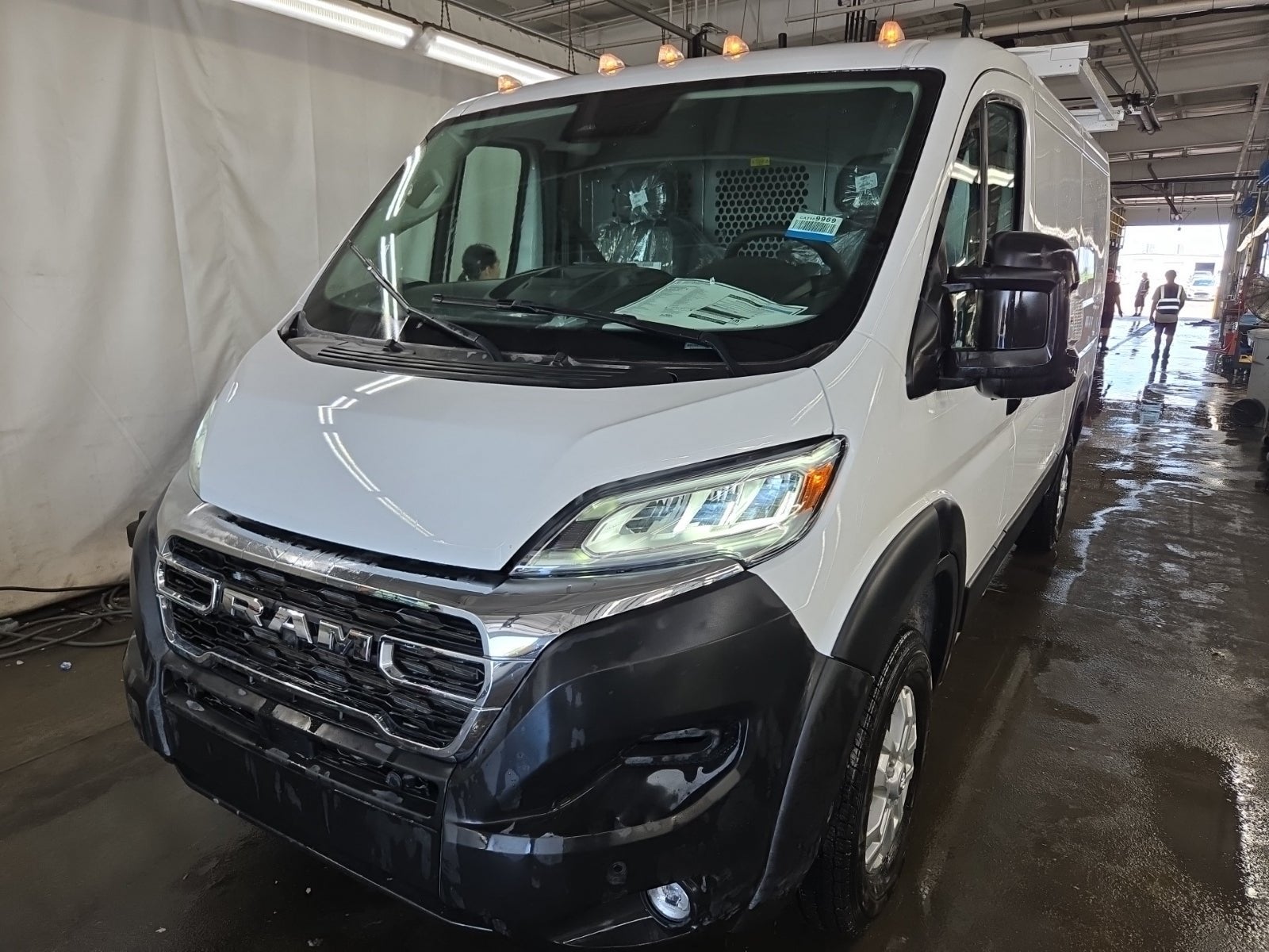 2025 RAM ProMaster 2500 Cargo Van SLT Low Roof 136' WB in Bright White Clearcoat — front three-quarter view