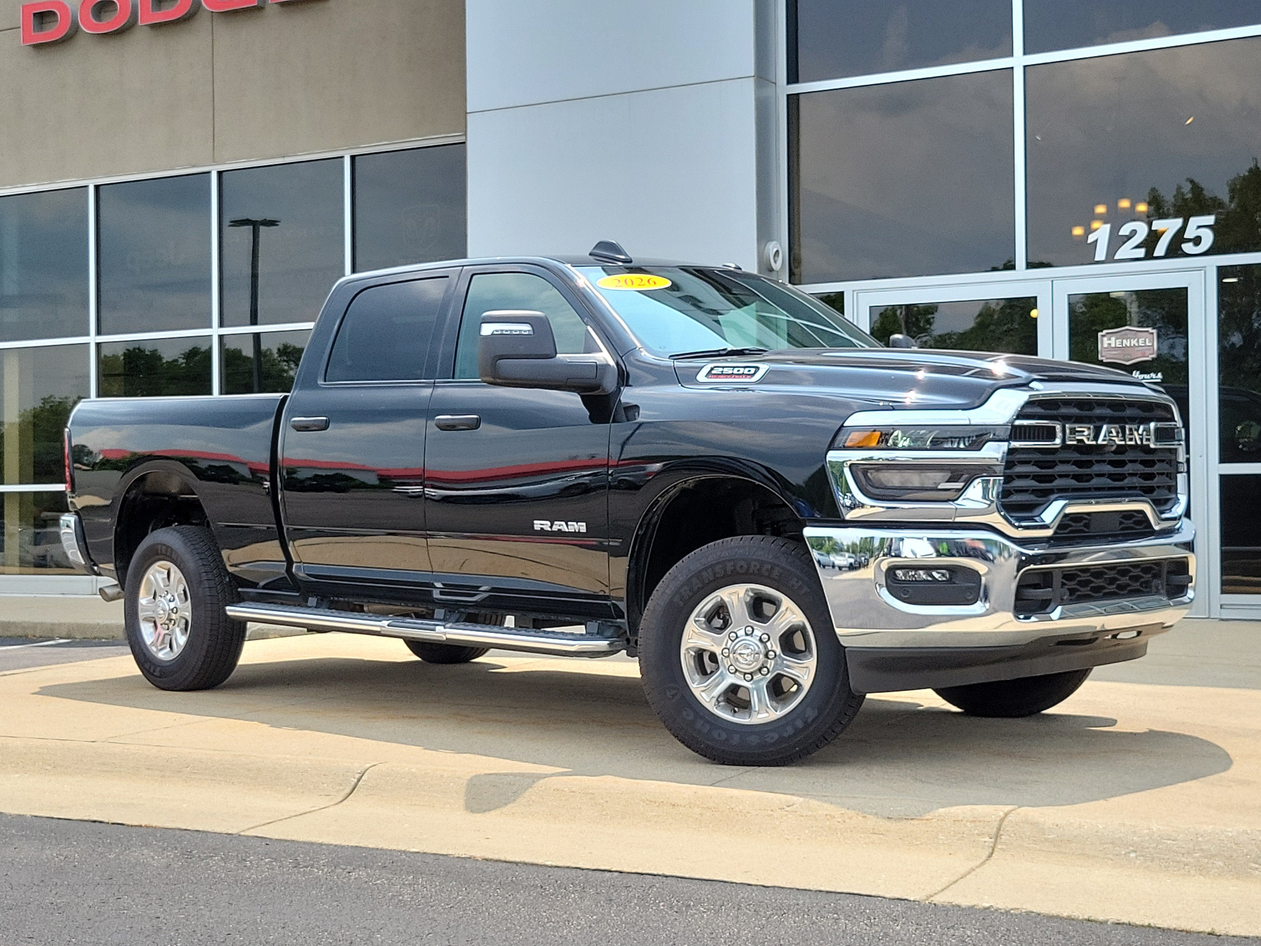 2026 RAM 2500 Big Horn Crew Cab 4x4 6'4' Box in Diamond Black Crystal Pearlcoat — front three-quarter view