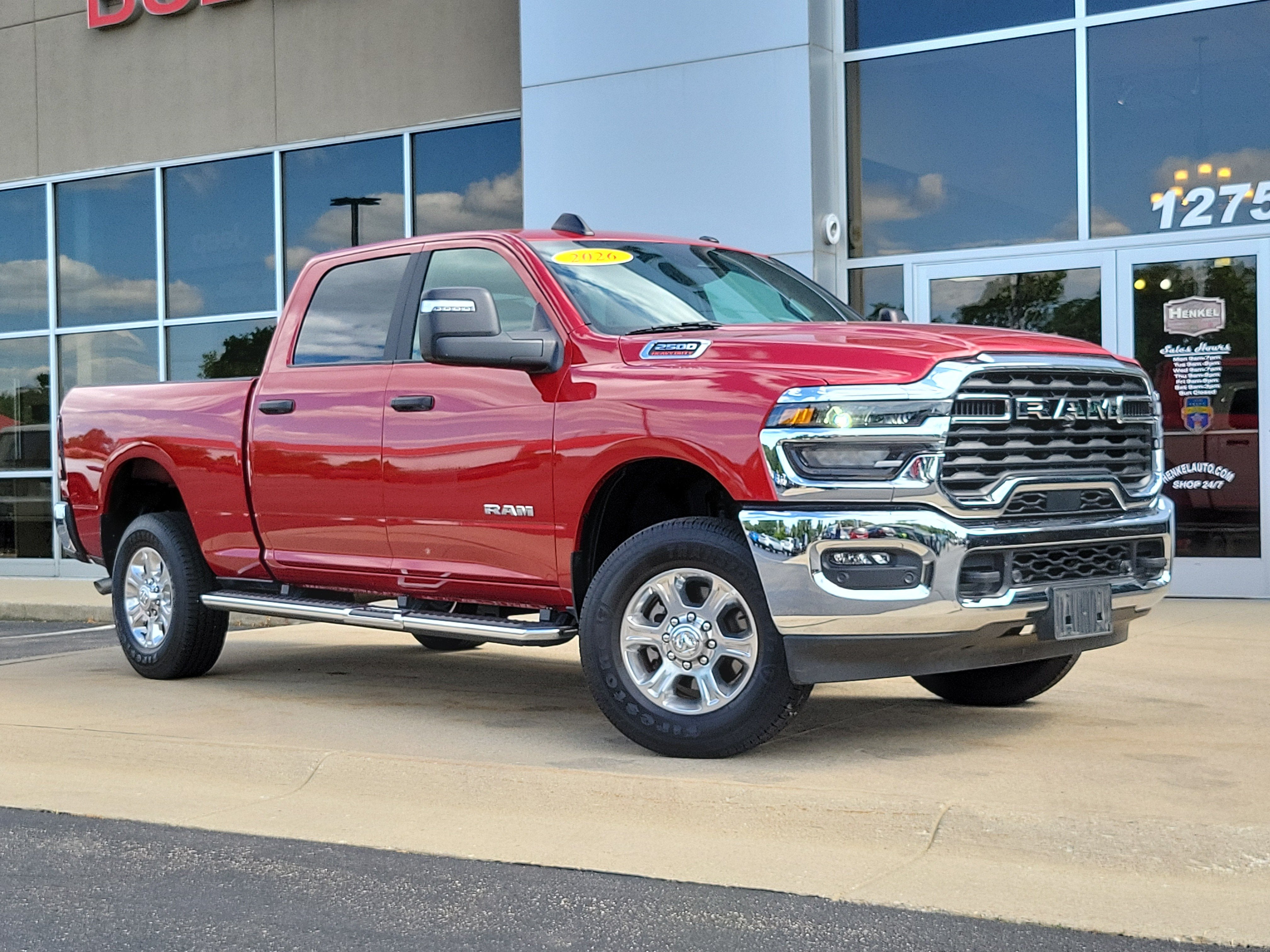 2026 RAM 2500 Big Horn in Molten Red Pearlcoat — front three-quarter view