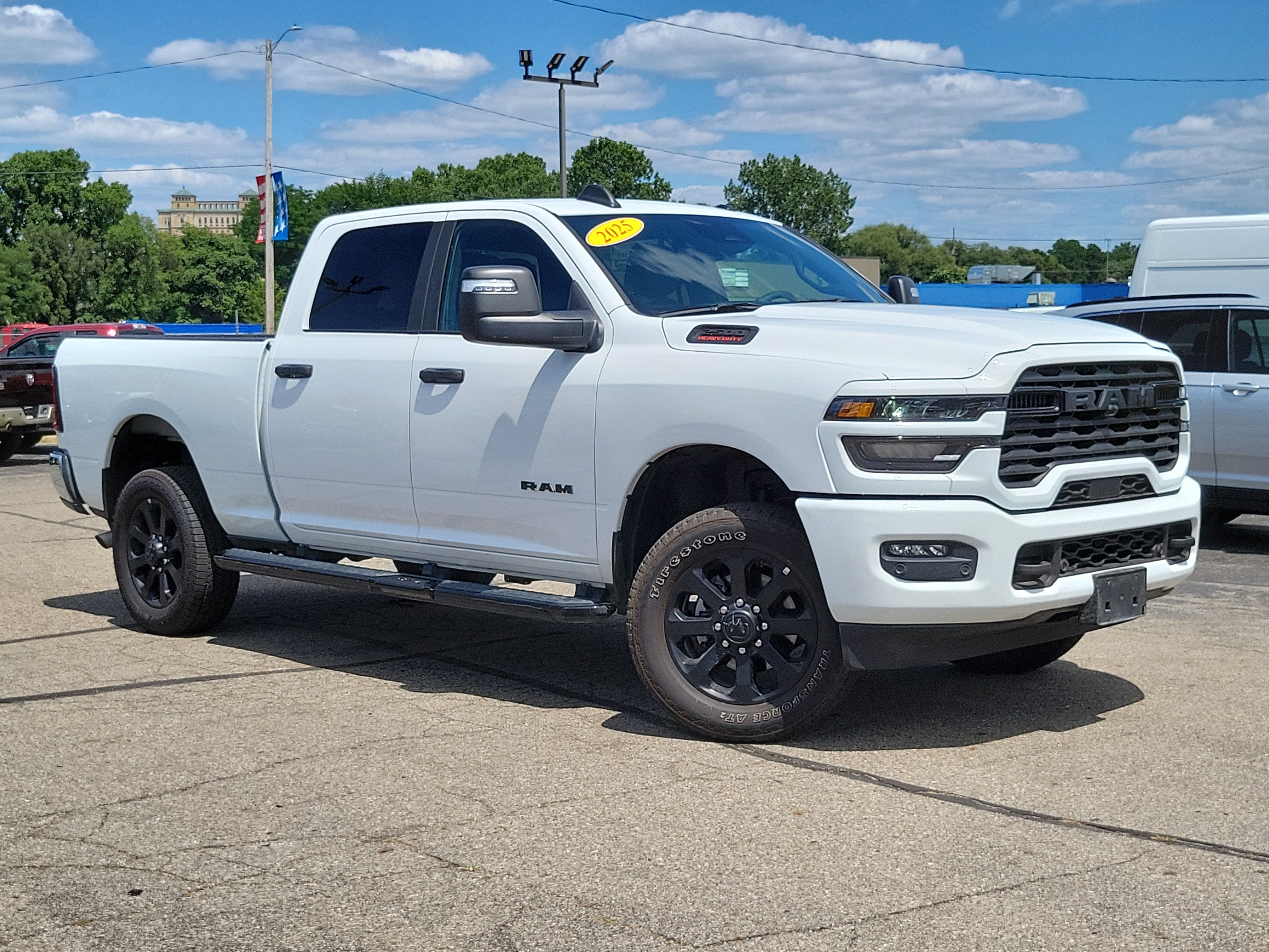 2025 RAM 2500 Big Horn Crew Cab 4x4 6'4' Box in Bright White Clearcoat — front three-quarter view