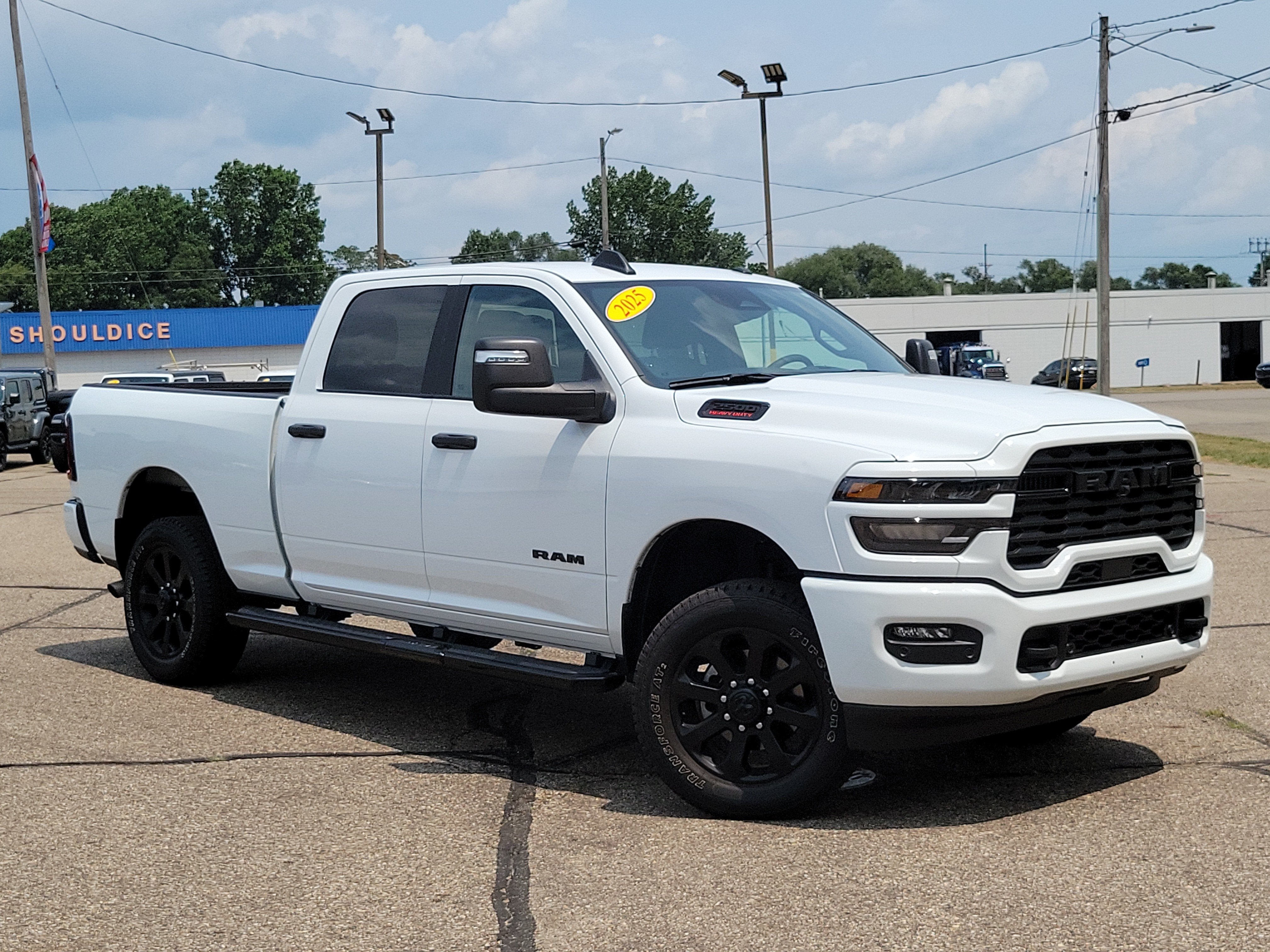 2025 RAM 2500 Big Horn Crew Cab 4x4 6'4' Box in Bright White Clearcoat — front three-quarter view