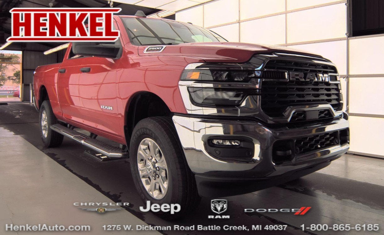 2026 RAM 2500 Big Horn Crew Cab 4x4 6'4' Box in Flame Red Clearcoat — front three-quarter view