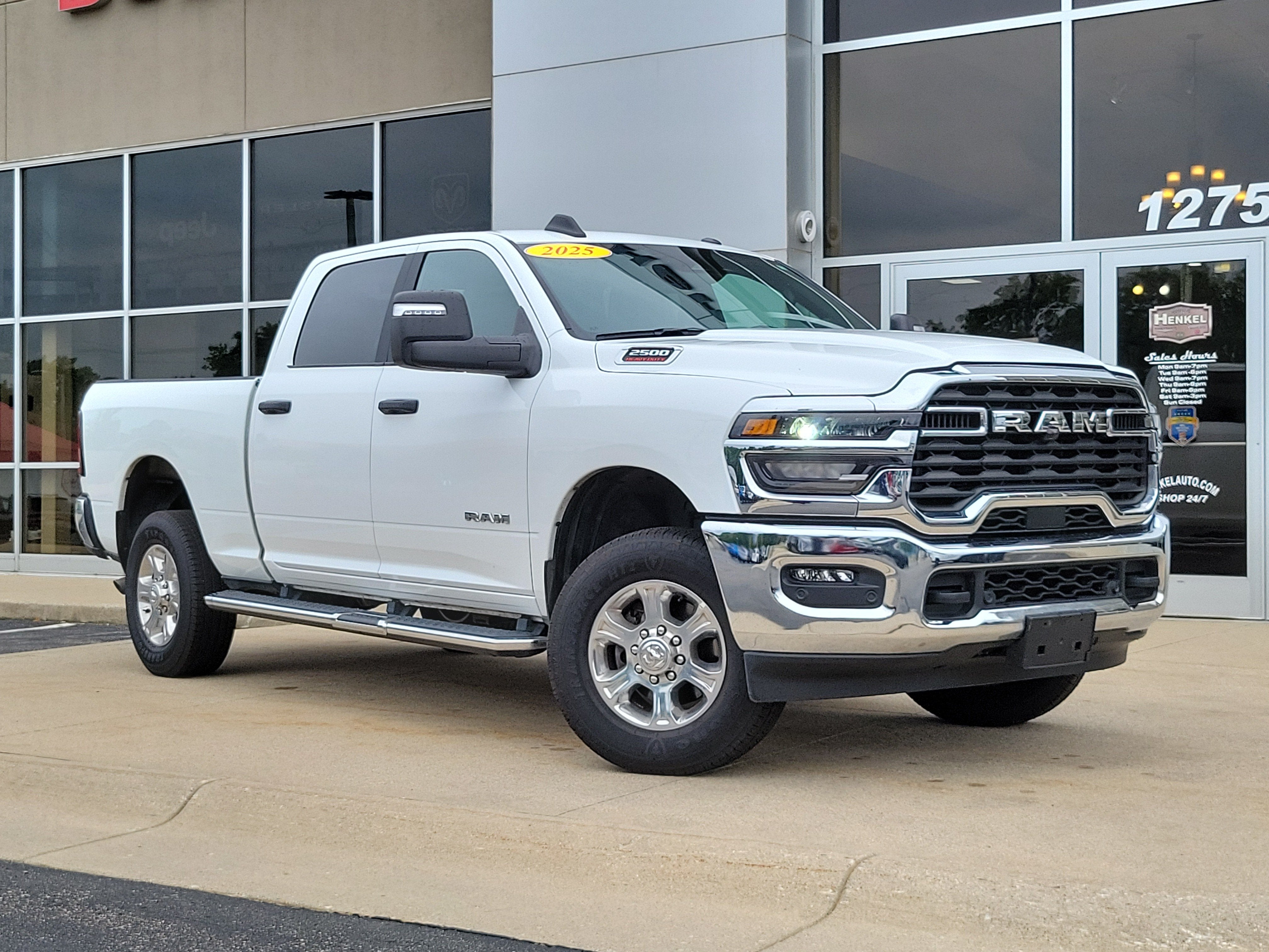2025 RAM 2500 Big Horn Crew Cab 4x4 6'4' Box in Bright White Clearcoat — front three-quarter view