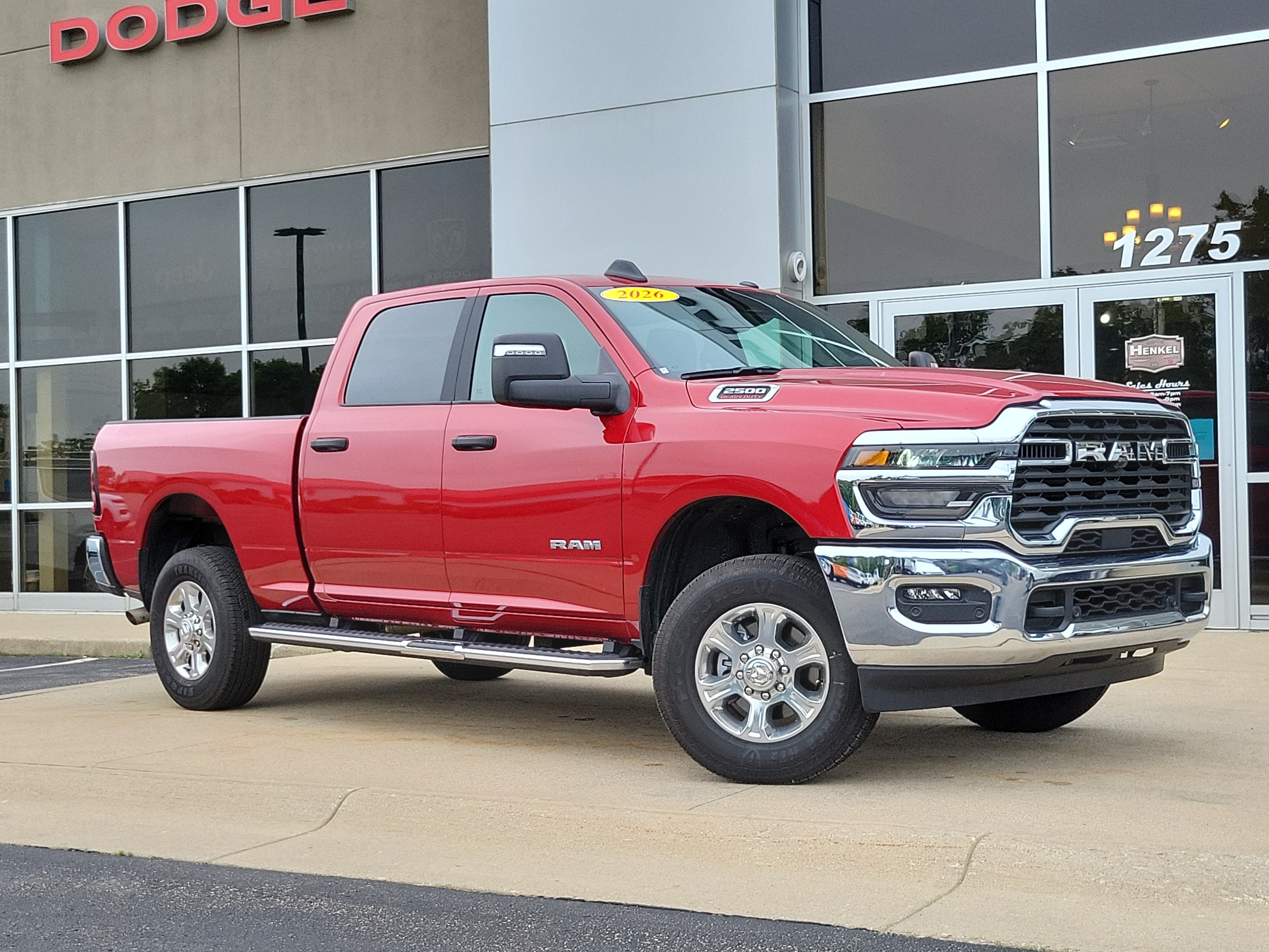 2026 RAM 2500 Big Horn Crew Cab 4x4 6'4' Box in Molten Red Pearlcoat — front three-quarter view