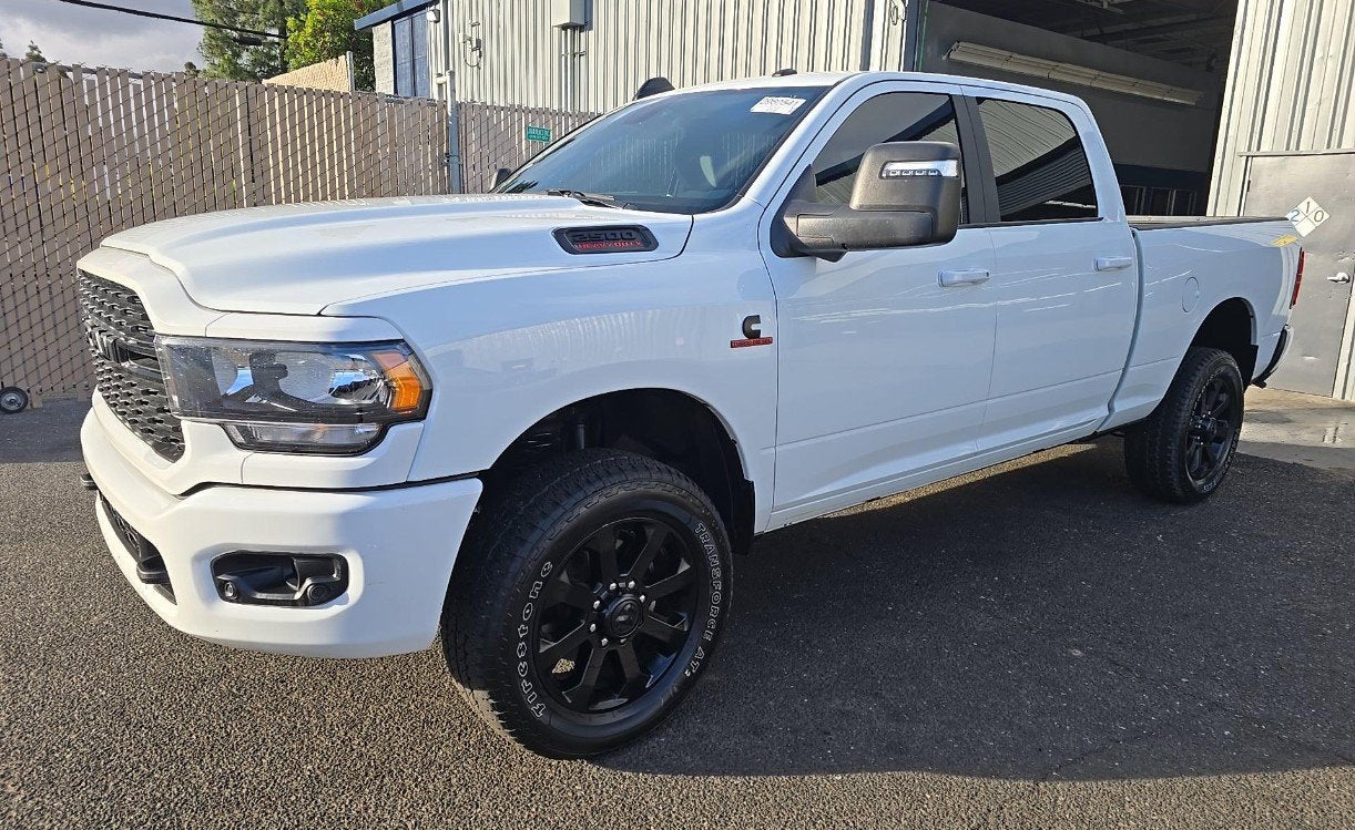 2024 RAM 2500 Big Horn Crew Cab 4x4 6'4' Box in Bright White Clearcoat — front three-quarter view