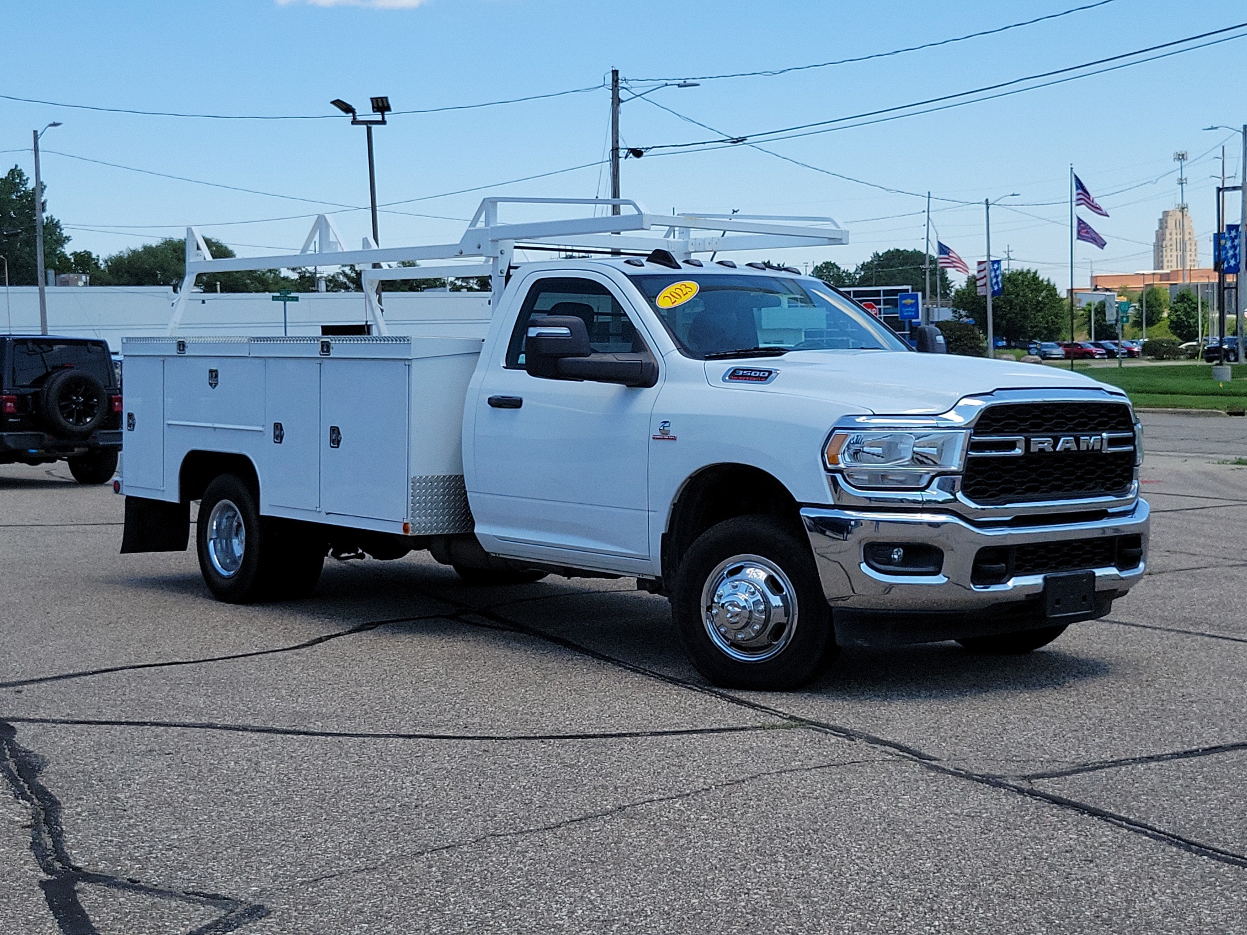 2023 RAM 3500 Chassis Tradesman/SLT in Bright White Clearcoat — front three-quarter view